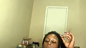 Ebony MILF masturbates with dildo and smokes